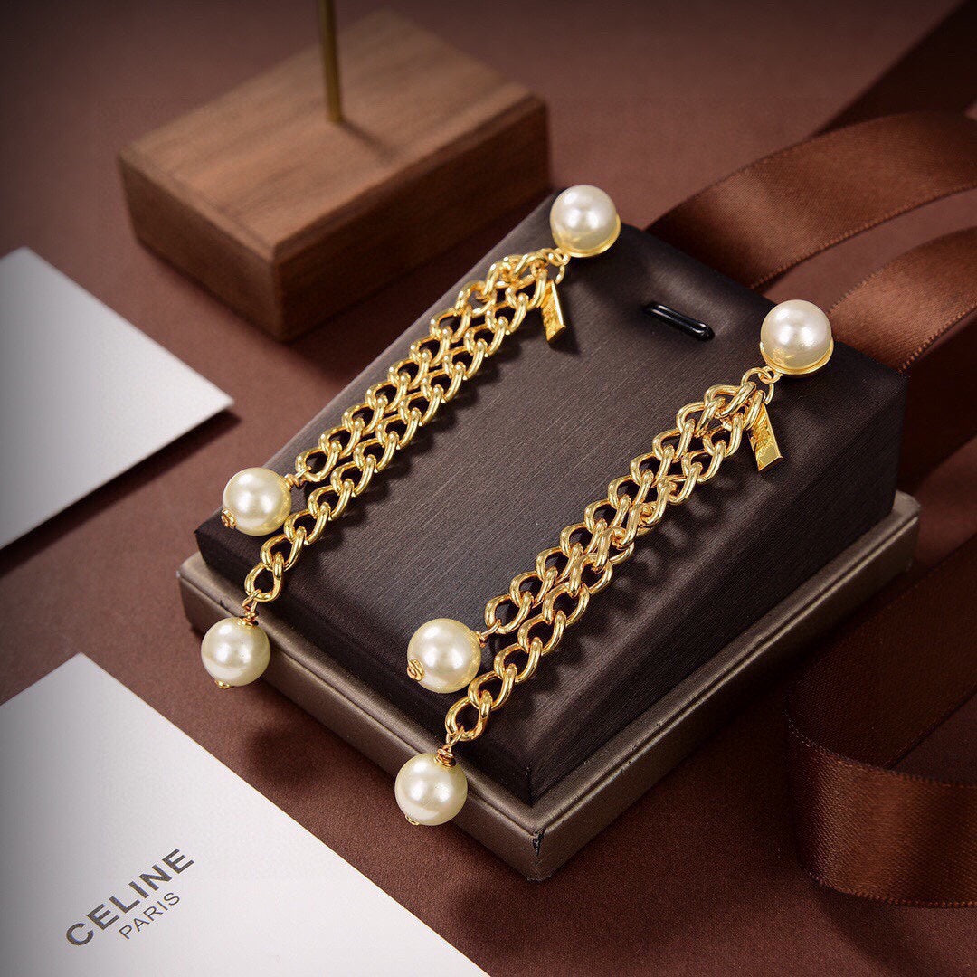 Celine Long 18K Gold Earrings